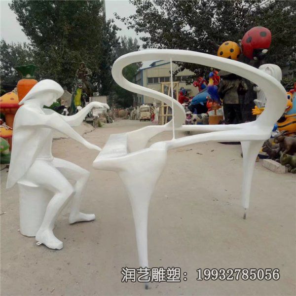 玻璃钢广场弹钢琴雕塑 玻璃钢广场弹钢琴雕塑