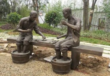 铜雕下棋人物雕塑