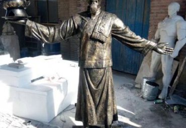 商业街店小二铜雕